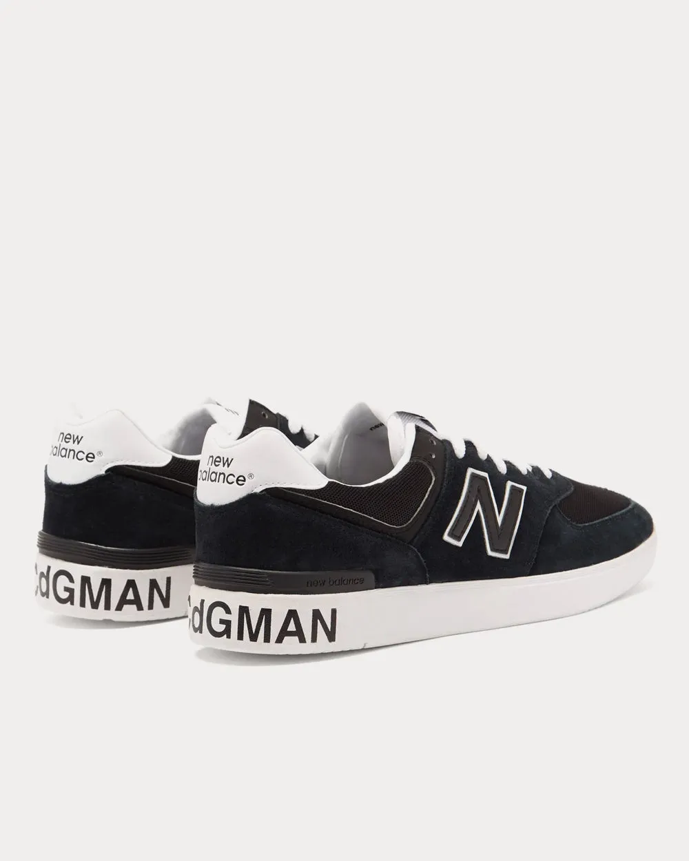 AM574 Suede Black Low Top Sneakers
