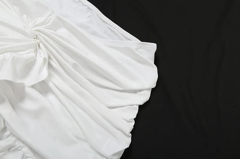 Luxe Long-Sleeve White Bodycon Mini Dress with Ruched Knot Detail and Ruffled Hemline