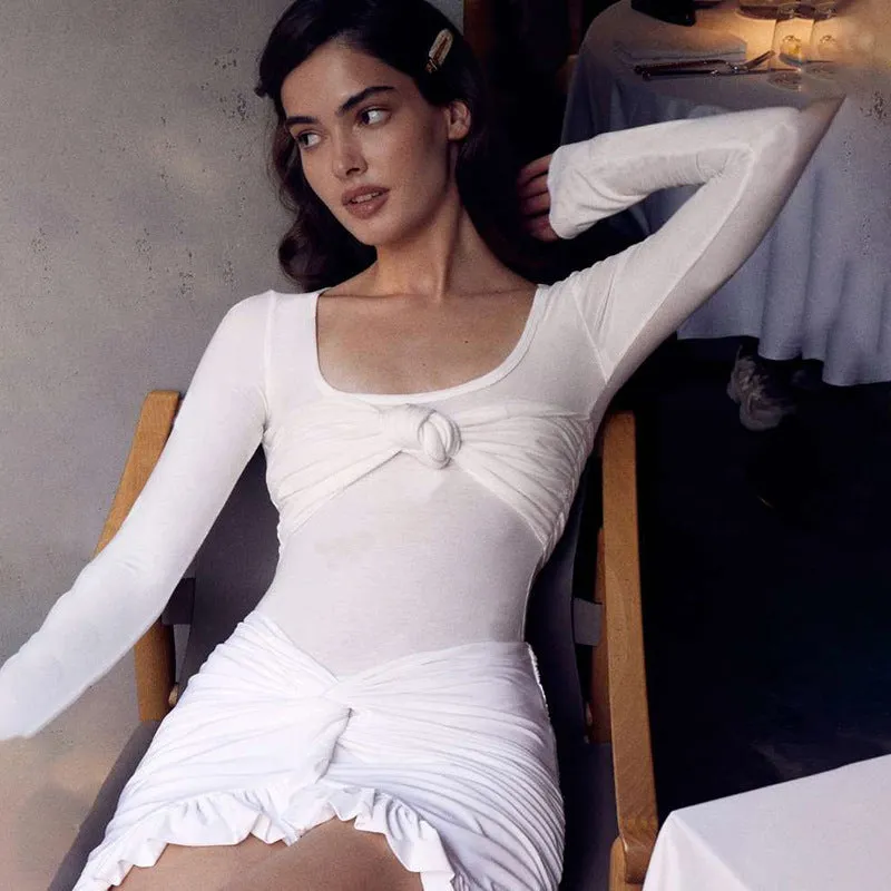 Luxe Long-Sleeve White Bodycon Mini Dress with Ruched Knot Detail and Ruffled Hemline