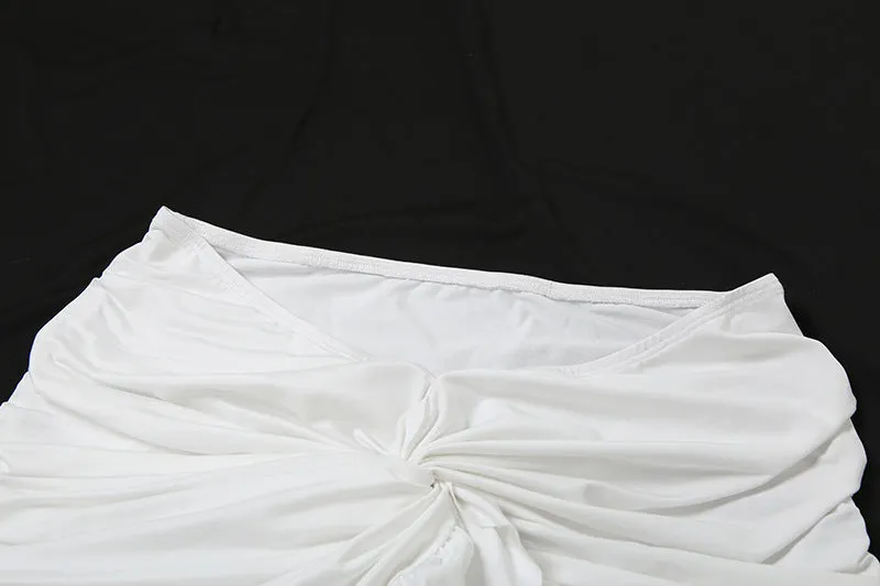 Luxe Long-Sleeve White Bodycon Mini Dress with Ruched Knot Detail and Ruffled Hemline